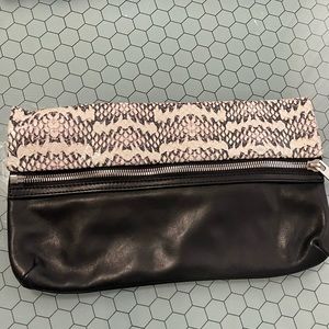 Oversized leather clutch.